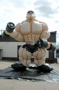 muscleman advertising inflatables for rent and sale in Coral Springs
